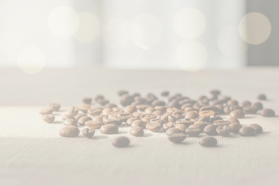 whole coffee beans on a cloth table