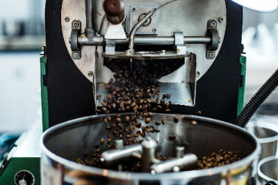 coffee beans ejecting from a roaster